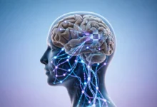 Person using AI assistant on laptop while thinking critically, representing the balance between artificial intelligence and human confidence