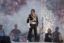 Actor portraying Michael Jackson performing on stage with iconic dance moves, capturing the energy and legacy of the King of Pop
